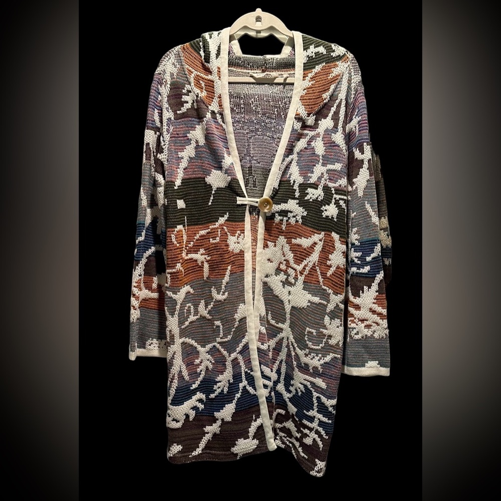 Long boho hooded sweater with large button toggle closure.